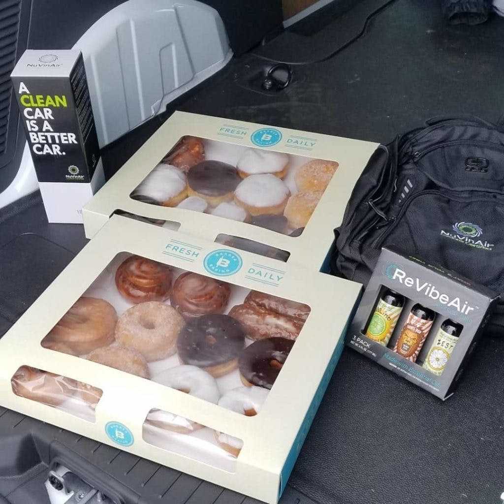 Donuts and demos. Zach Haman and his team routinely show up to dealership customers with donuts, golf balls, and other items to show their appreciation.